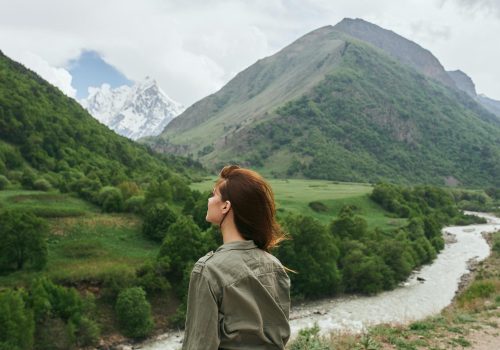 woman hiker mountains landscape travel fresh air. High quality photo
